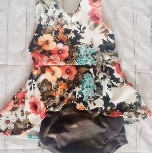 Brand new peplum and bummie set